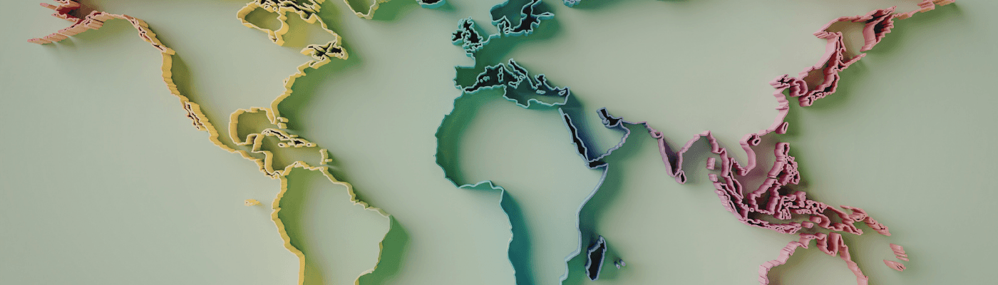 A colorful three-dimensional relief map of the world with continents rendered in layered pastel tones, representing the global focus of Unit 4's exploration of economic development and international trade.